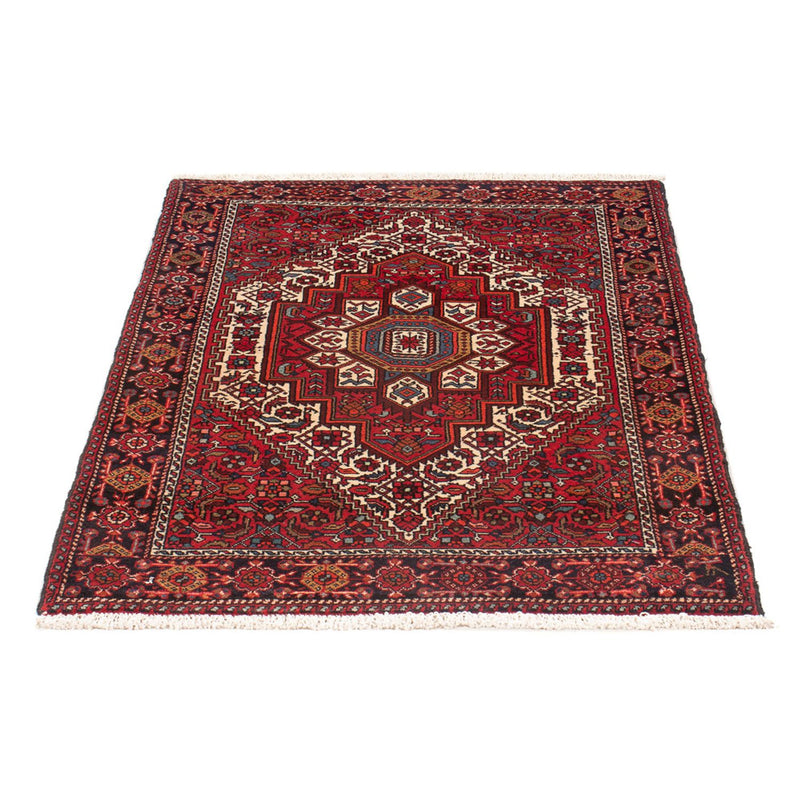 Tapis persan - Nomadic - 111 x 68 cm - rouge clair